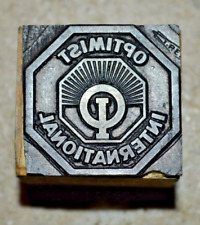 Vintage Letterpress Printer's Block - Optimist International emblem/logo picture
