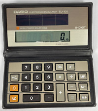 Vintage CASIO SL-100 8-Digit Electronic High-Power Solar Cell Calculator W Case picture